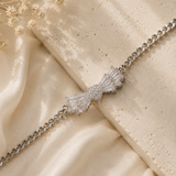 Crystal Baguette Bow & Pavé Heart Curb Chain Bracelet – Silver