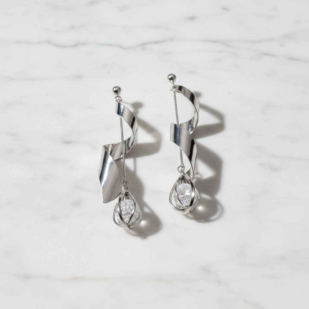 Spiral Twist Crystal Drop Earrings on White Marble