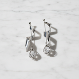 Spiral Twist Crystal Drop Earrings on White Marble