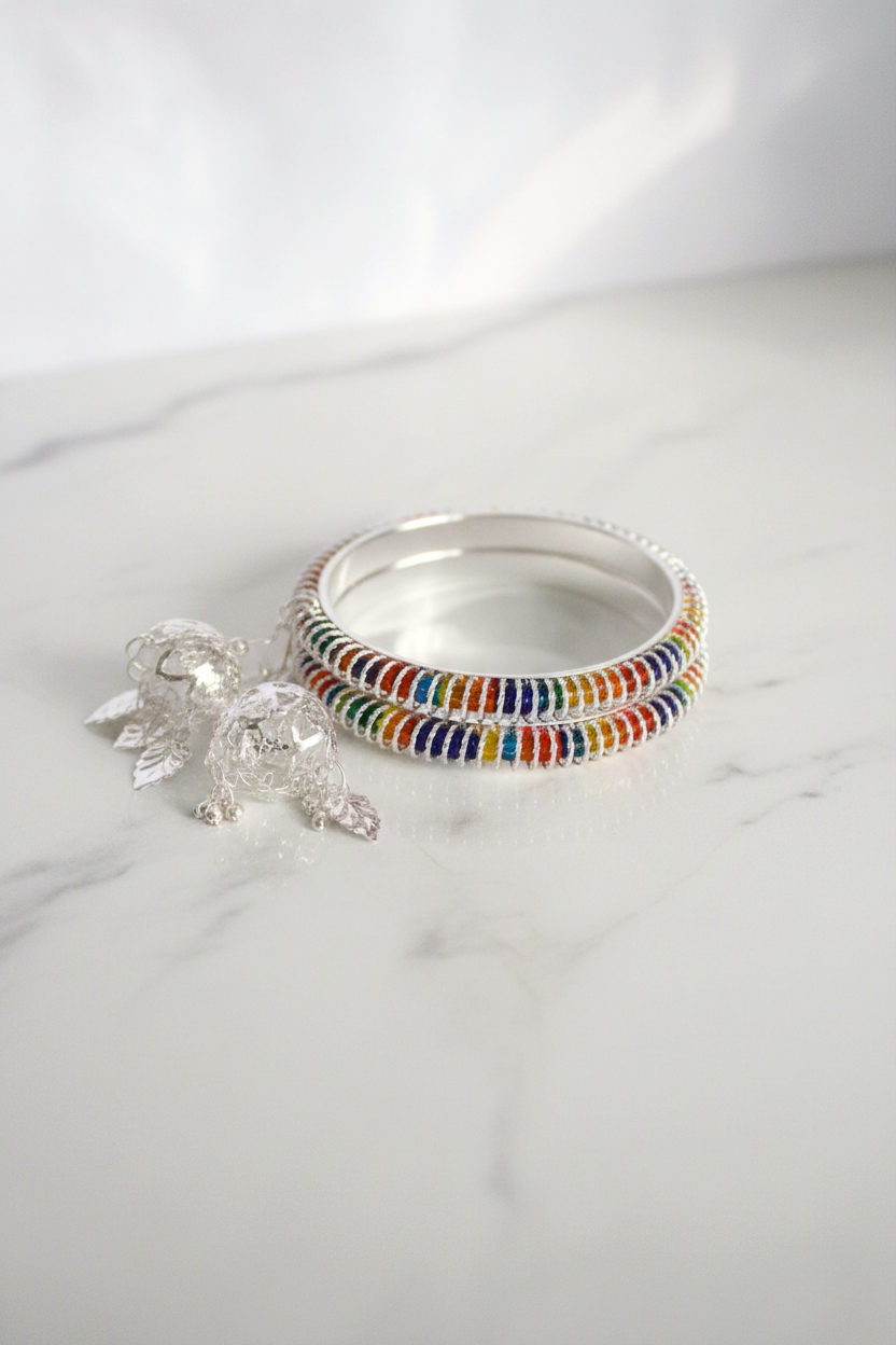 Rainbow Enamel Silver Bangles and Jhumka Set on White Marble