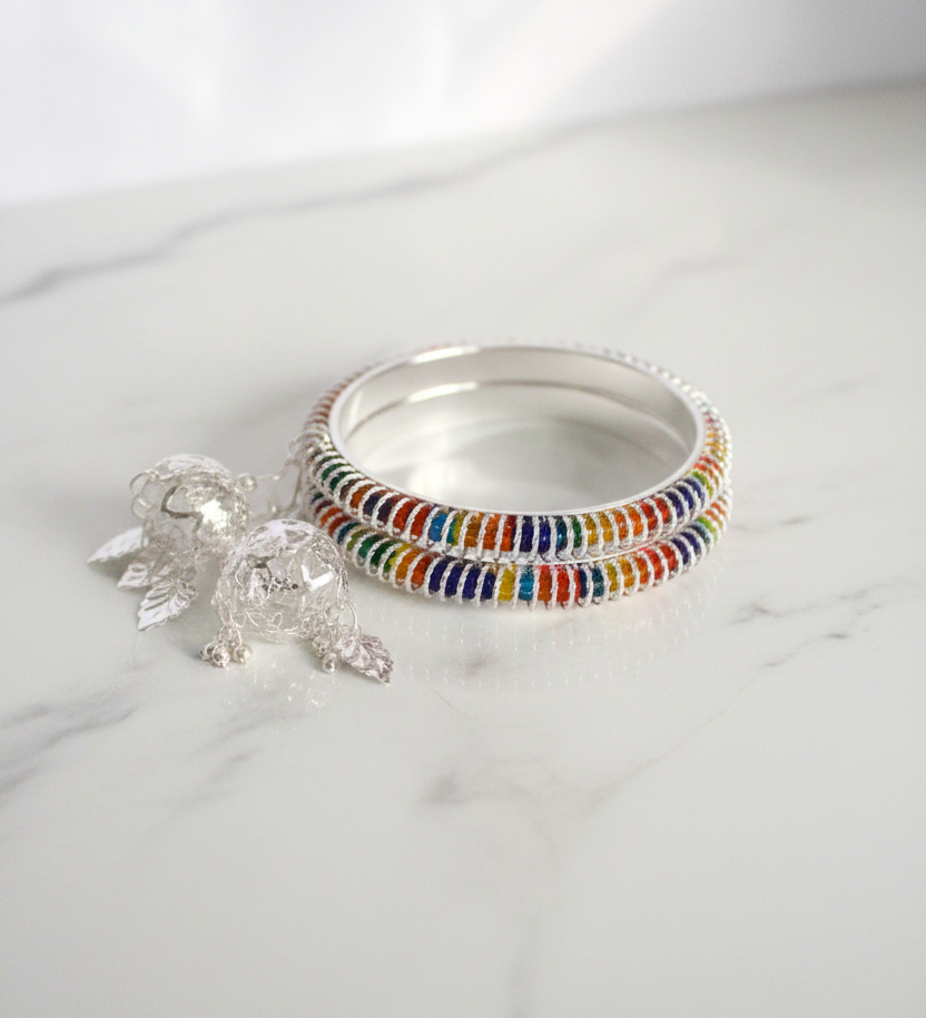 Rainbow Enamel Silver Bangles and Jhumka Set on White Marble