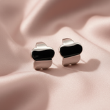 Silver and Black Enamel Chunky Heart Stud Earrings on Blush Satin
