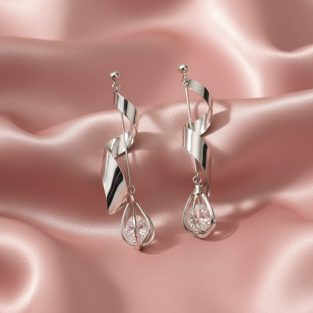 Spiral Twist Crystal Drop Earrings on Blush Satin