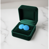 Blue Matte Round Stud Earrings on White Marble